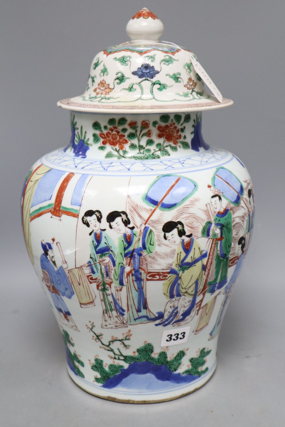 A Chinese Wucai jar and associated cover, height excluding cover 32cm